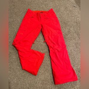 North Face size L ski pant. Only worn a few times. Bright fun color.